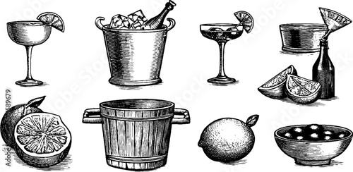 Cocktail glasses and citrus arranged with ice bucket