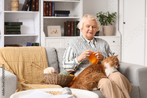 Senior woman with cute fluf...