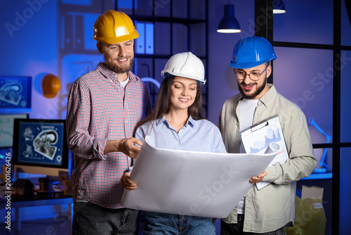 Group of engineers working ...
