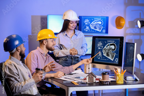 Group of engineers working ...