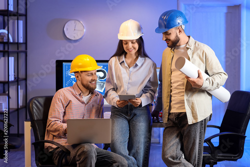 Group of engineers working ...