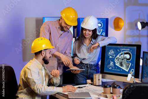 Group of engineers working ...