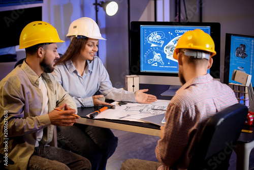Group of engineers working ...