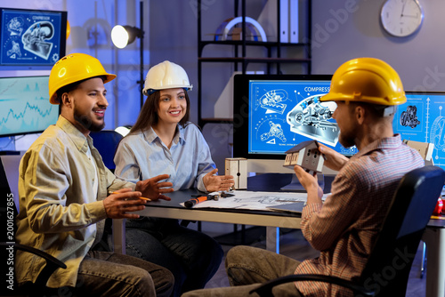 Group of engineers working ...