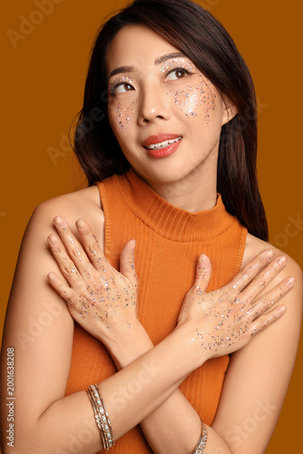 Beautiful young happy Asian...