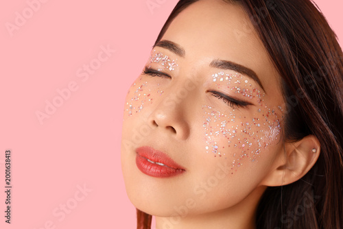 Beautiful young Asian woman...
