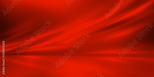 An abstract, red, silky background with a smooth curve with vibrant elegance and visual richness, the sleekness creates an atmosphere of sophistication and depth. 