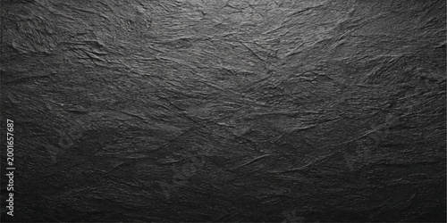 Textured slate surface, revealing the intricate patterns and rugged beauty of natural stone, exuding a sense of timeless elegance and organic texture.