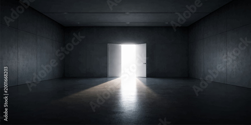 A single beam of light in the dark illuminates an empty long corridor within the architectural interior of this building.