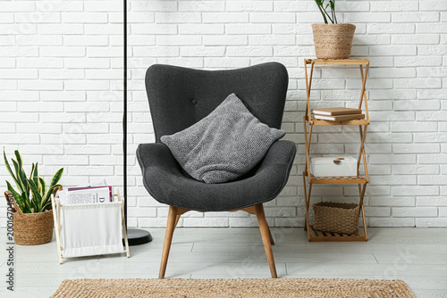 Comfortable black armchair ...