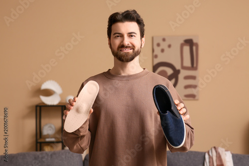 Young man with orthopedic i...