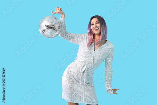Young happy woman in pink w...