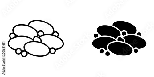 Collection of seven small ovals and circles graphic elements in outline and solid black versions for design.