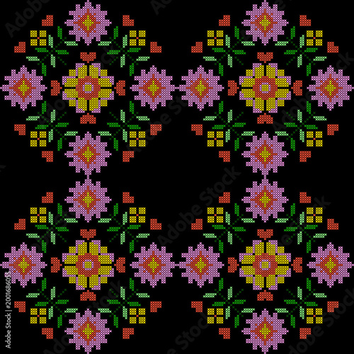 Colorful floral cross-stitch seamless pattern on black background, traditional embroidery folk art style for textile and craft design.