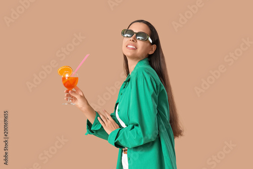 Young woman in sunglasses w...