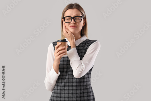 Young businesswoman with cu...