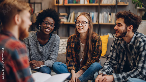 Diverse University Students Sharing Ideas and Laughter in a Cozy Library Study Group.