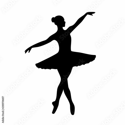 Silhouette of a ballerina in a tutu performing a ballet pose