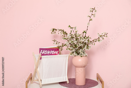 Magazines in holder and vas...