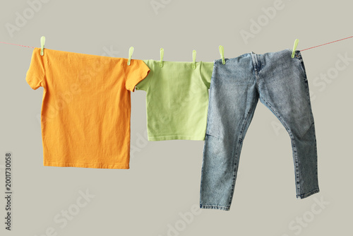 Clean clothes hanging on ro...