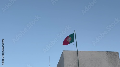 flag of Portugal on a blue sky background