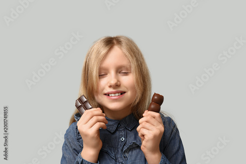 Happy little girl with swee...