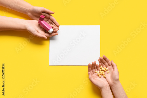 Child's hands with blank ca...