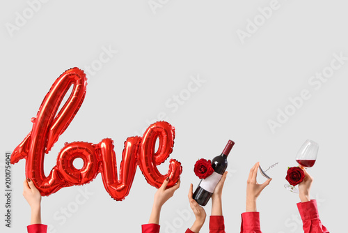 Women with word LOVE made o...