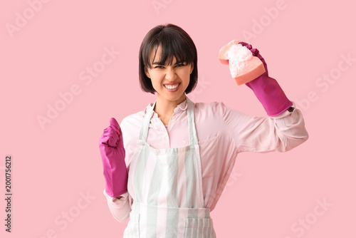 Angry young woman with spon...
