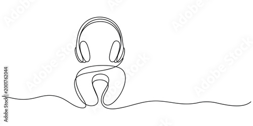 Single line of headphones resting on a neck pillow travel comfort audio in white background