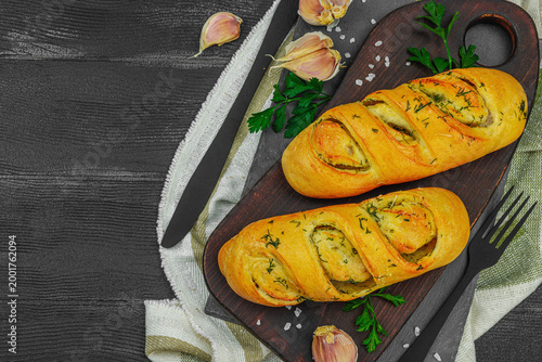 Fresh baked garlic bread, gluten free buns. Tasty food, fresh parsley, fragrant spices