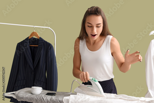 Shocked young businesswoman...