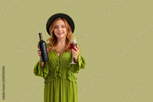 Mature woman with bottle an...