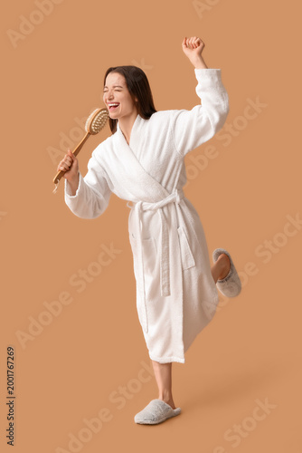Beautiful woman in bathrobe...