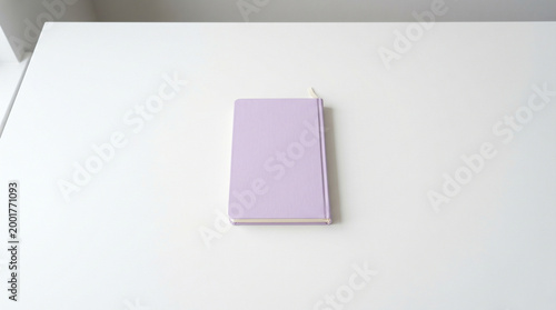 Soft lavender journal book on clean white table surface