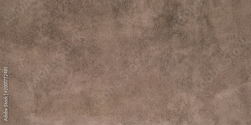 An abstract textured brown surface, ideal for various design uses, providing an aesthetically pleasing backdrop for creative projects.