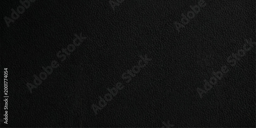 A minimalist backdrop of sleek black surface is an ideal design choice for displaying any subject matter with high contrast. 