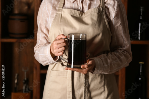 Woman with mug of tasty kva...