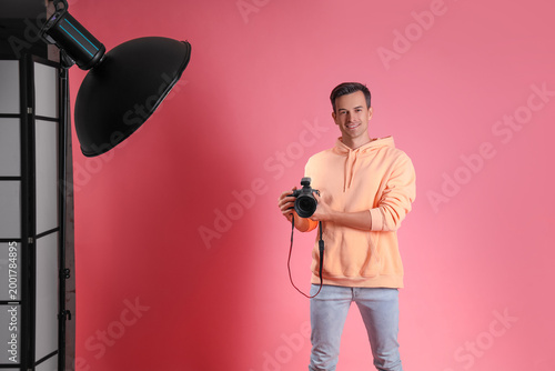 Male photographer with came...