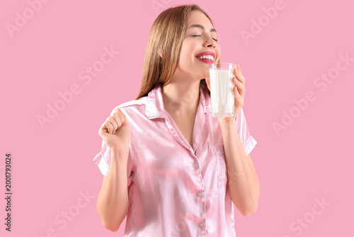 Young woman with milk on pi...