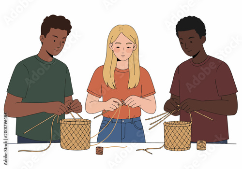 Obraz na plátne Diverse group of young people participating in a creative workshop, learning the traditional handicraft of basket weaving together