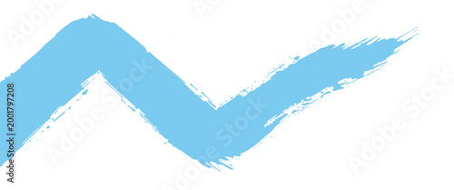 Light blue paint stroke zigzag shape with textured edges and speckles on white background brush