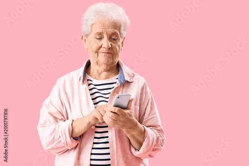Senior woman using mobile p...