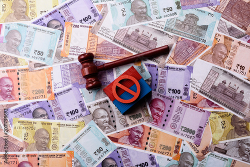 фотографія The cargo container ban on the Indian money as a conceptual backdrop