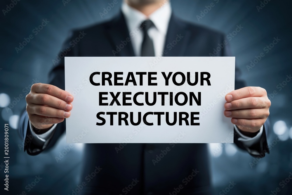 Obraz premium Businessman with a Sign to Create Your Execution Structure