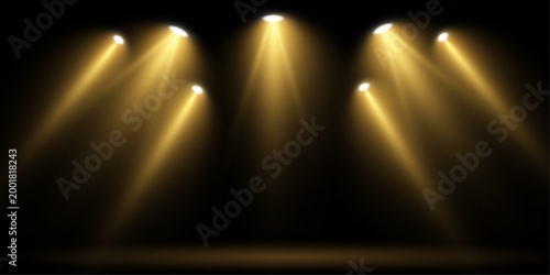 Warm golden spotlight beams shining on stage podium with elegant atmosphere and glowing cinematic lens flare