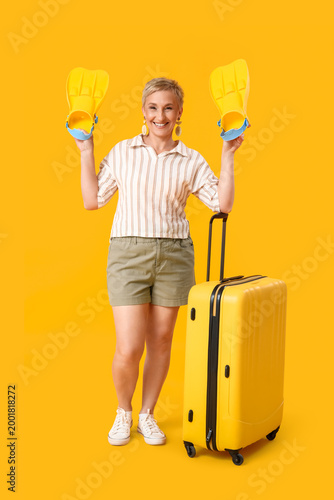 Mature woman with flippers ...