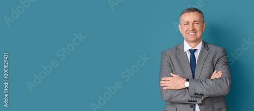 Portrait of mature business...