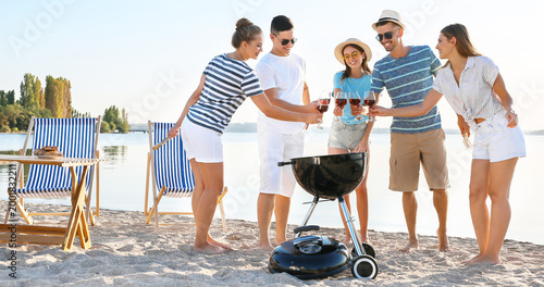 Friends at barbecue party n...