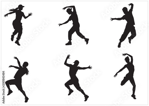 A set of street dance hip hop dancers in silhouette	